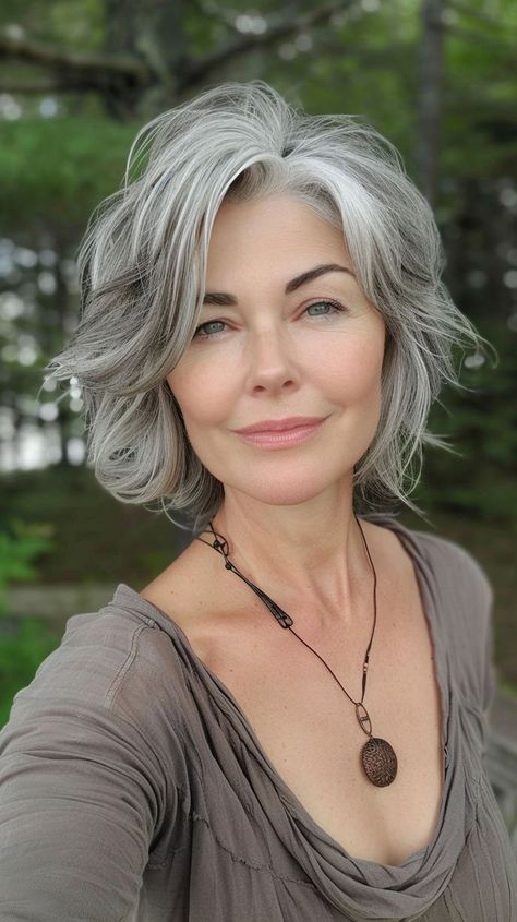 Embrace youthfulness with these 22 trendy medium-length layered haircuts. Fresh, fun, and full of life, these styles will add a playful vibe to your overall look. Grey Bob Hairstyles, Grey Hair Over 50, Grey Hair Transformation, Grey Hair Inspiration, Beautiful Gray Hair, Medium Length Hair With Layers, Gray Hair Cuts, Wavy Haircuts, Short Grey Hair