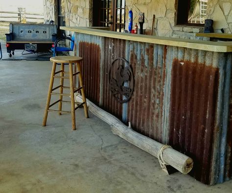 I made this country western bar using pallets for the base and wrapping old rusty galvanized roof tin for the character.  #Backyard, #Outdoor, #RecyclingWoodPallets #DIYPalletBars Brewpub Interior, Pallet Backyard, Palet Bar, Rustic Bars, Galvanized Roof, Pallet Bars, Western Bar, Western Saloon, Pallet Bar Diy