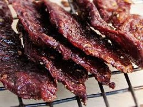 Make delicious beef jerky in your own kitchen. No dehydrator or specialist equipment required. Lasts for months, excellent for camping trips, days out, or just as tasty snacks. Thai Beef Jerky, Beef Jerky Marinade, Jerky Marinade, Beef Jerky Recipe, Best Beef Jerky, Jerky Recipe, Homemade Jerky, Thai Beef, Beef Jerky Recipes