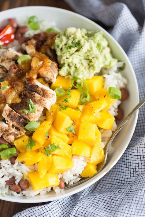 Mango, mashed avocado, bell peppesr and jerk seasoned chicken on top of coconut rice and red beans. These Caribbean Jerk Chicken Bowls are packed with flavor! | tastesbetterfromscratch.com Bbq Chicken Bowl, Chicken Bowl Recipe, Caribbean Jerk Chicken, Chicken Bowls, Tastes Better From Scratch, Seasoned Chicken, Jerk Seasoning, Mashed Avocado, Chicken Bowl