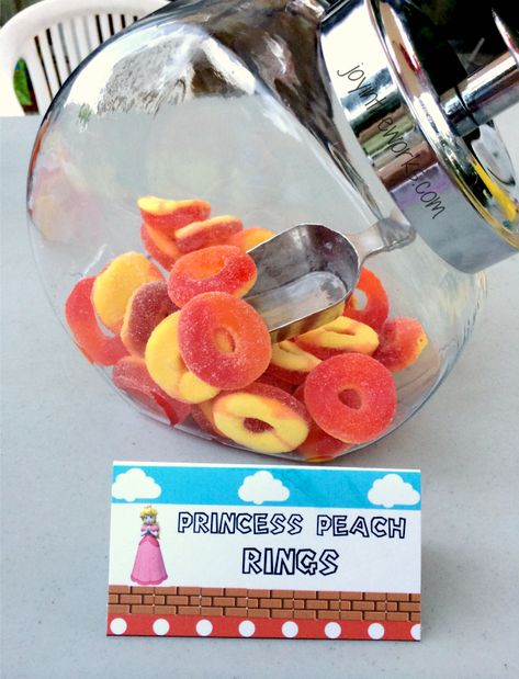 Party snack: Princess Peach rings Princess Peach Pool Party, Princess Rosalina Birthday Party, Princess Peach Birthday Party Favors, Supermario Theme Party Food, Princess Peach And Daisy Birthday Party, Princess Peach Dessert, Princess Peach Candy Table, Princess Daisy Party, Princess Peach Birthday Ideas