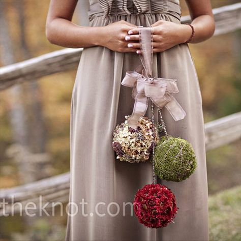 The bridesmaids carried three-tiered organic, moss and floral pomanders that blended perfectly with the autumn setting. Bridesmaid Flower Alternative, Bridesmaid Flower Ball, Alternate Bridesmaid Bouquet, Bridesmaid Bouquet Alternatives Winter, Kissing Balls Wedding Bridesmaids, Pom Pom Wedding Bouquet, Bridesmaid Bouquet Alternatives, Floristry Design, Pomander Balls