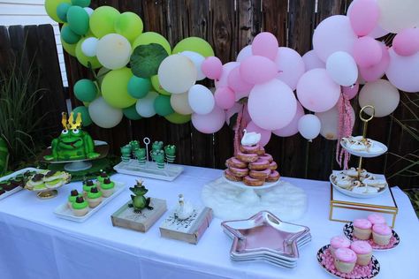 Swan Princess or a Frog Prince gender reveal | CatchMyParty.com Princess And The Frog Gender Reveal Ideas, Princess And Frog Gender Reveal, Shrek Gender Reveal, Princess And The Frog Gender Reveal, Frog Gender Reveal, Gender Reveal Ideas Green And Purple, Putters Or Pearls Gender Reveal Cake, Princess And Frog Baby Shower Decorations, Gender Reveal Party Ideas