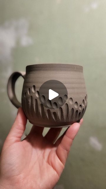 Aleatha Aiken-Sherrer on Instagram: "Carve a mug with me! 
This mug will be glazed in layers of colour that, if all goes to plan, will melt into the texture and break over the edges. 
.
.
Tools, just in case you're curious 😘
Loop tool by @dolantools
Carving tool by @diamondcoretools 
Stamp by 4clay.com
Hook/blade tool by @kempertoolschinoca 
.
.
.
#pottery #carving #clay #satisfying #gouge #dig #texture #ceramics #tools #Art #aleatha #aleathabean" Texture On Pottery Ideas, Carving Clay Ideas, Carving Pottery Mugs, Pottery Carving Tools, Carving Clay Ideas Patterns, Carving Pottery Ideas, Pottery Texture Ideas, Pottery Carving Ideas, Carved Mugs