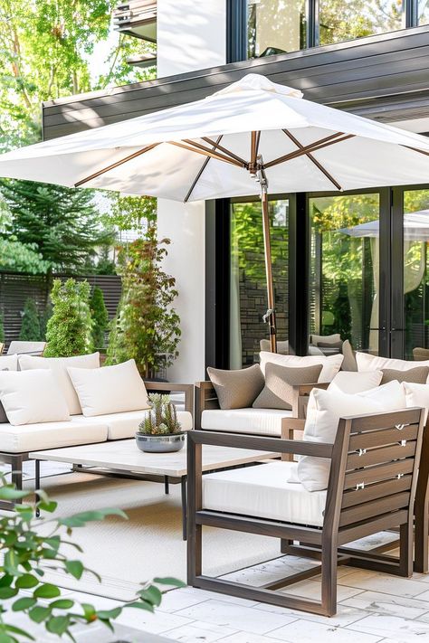 Outdoor furniture on a modern patio Pergola Patio Furniture Ideas, Modern Outdoor Furniture Patio, Exterior Furniture Design, Amazon Outdoor Furniture, Florida Outdoor Patio Ideas, European Outdoor Patio, Outdoor Patio Furniture Ideas Layout, Covered Patio Furniture Layout, Modern Patio Furniture Ideas