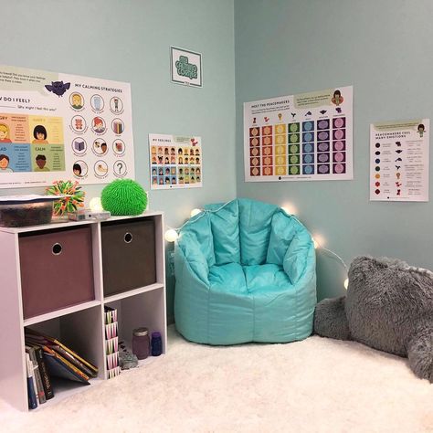 A calm down corner is a safe and non-punitive space for your child to regulate their emotions, take a time-in, and calm their bodies. Calming Room Ideas, Counselling Room, Calm Down Kit, Calm Room, School Counseling Office, Calming Room, School Counselor Office, Calming Corner, Calm Down Corner