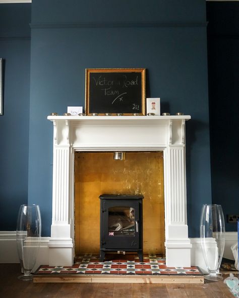 @victoria_road_restoration on Instagram: “The gold leafed toughened glass has been fitted behind the fireplace and I’m pretty happy with the result. Considering the gold tiles I…” Gold Leaf Fireplace Surround, Gold Leaf Fireplace, Gold Fireplace, Victorian Flat, Gold Tiles, Simple Fireplace, Gold Tile, Log Burner, The Fireplace