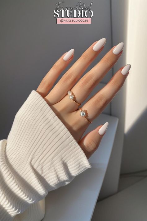 "Experience the natural beauty of short white nails with a touch of elegance and simplicity. Watch as the delicate curves and smooth texture of the nails are brought to life in stunning detail." #WhiteNails #WhiteNailsDesigns #WhiteNailsAcrylic #WhiteNailsIdeas #ShortWhiteNails #WhiteNailsWithGlitter #NailArtInspiration #DIYNailArt #GlitteryWhiteNails #NaturalWhiteNails #AlmondNailDesigns #ElegantNailStyles #NailArtTrends #NailCareTips #WinterNailInspiration Classic White Evening Rings, Pure White Nails, Short White Nails, White Glitter Nails, Curved Nails, Nail Care Tips, Art Trends, Elegant Nails, Elegant Designs