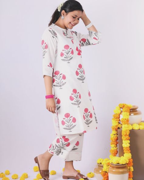 Step out in style with our Fiza kurta set! Made with delicate block print on pure cotton fabric, this elegant and feminine set will have you turning heads. Complete with lace and tassel details, this kurta set is perfect for any occasion. Feel comfortable and chic in this must-have piece! Model is wearing size: L Fit type: Relaxed Fabric: 100% cotton Craft type: Block printing Top length: 42 inches Bottom length: 38 inches #aamvi #kurtaset #kurtas #coord #blockprinted #officewear #fest... Cotton Kurta Set, Cotton Craft, Festive Collection, Cotton Crafts, Cotton Kurta, Design Language, Block Printing, Kurta Set, Office Wear