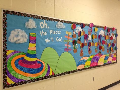 I'm so proud of my bulletin board for Read Across America week! Oh the Places You'll Go by Dr. Seuss Graduation Bulletin Board, Dr Seuss Bulletin Board, Read Across America Week, Dr Seuss Classroom, Summer Bulletin Boards, School Hallway, March Themes, Seuss Classroom, Seuss Crafts