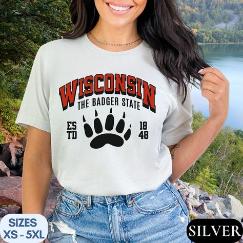 The Badger State Wisconsin Shirt, Midwest T Shirt Gift Wisconsin Tshirt State Name Shirt WI Tee Shirt College Apparel University Shirt Top by AllianasCreations on Etsy College Apparel, Wisconsin State, University Shirt, Top Gifts, College Outfits, Badger, Shirt Top, Wisconsin, San Jose