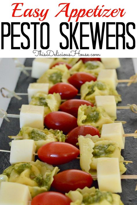 Super simple appetizer recipe with tortellini, cherry tomatoes, and provolone. Don't miss my tip for making these tortellini pesto skewers ahead! #tortelliniskewers #easyappetizer Pesto Skewers, Recipe With Tortellini, Pesto Tortellini Skewers, Tortellini Pesto, Pesto Appetizers, Fast Appetizers Easy, Tortellini Skewers, Fast Appetizers, Italian Appetizer