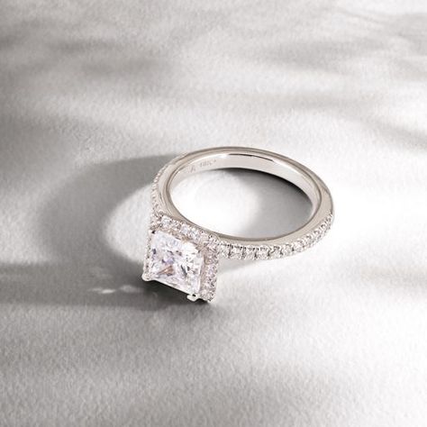 This Majesty engagement ring pairs the brilliance of fine diamond pave with simple, smooth architecture and meticulous craftsmanship that is hallmark John Atencio. 18-karat White Gold 1.00 Carat Setting Diamond sold separately Pavé Diamonds, 0.32 total carat weight Settings can be made for any Diamond size. Contact a John Atencio Bridal Concierge Ring, Stock Size 6.5 Luxury Polished Finish Diamond Wedding Ring, Platinum Diamond Ring For Proposal, Point No Point Studio Ring, Smooth Architecture, Gia Certified Platinum Proposal Rings, Cathrine Piaz Wedding Ring, Enagement Rings, Matching Band, Diamond Sizes