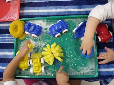 Vehicle Science Preschool, Car Activities For Preschoolers, Car Provocations, Car Wash Sensory Bin, Car Garage Role Play Eyfs, Vehicle Sensory Play, Car Wash Activity, Cars Preschool, Transportation Preschool Activities