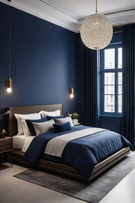 Modern bedroom with bold accent wall Bold Accent Wall, Moody Maximalist, Dark Modern House, Mobile Home Redo, Blue Accent Wall, Light Blue Throw Pillows, Bedroom Board, Indigo Walls, Navy Bedrooms