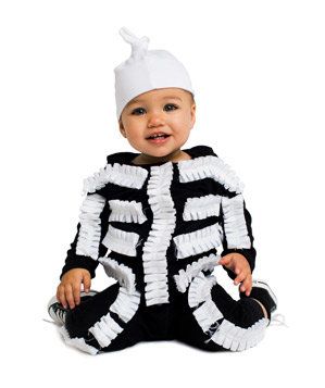 24 Handmade Halloween Costumes for Kids | Don't be frightened by the idea of making your own costume from scratch. With these creative DIY Halloween costumes ranging from simple to more advance, we've got you covered. This sweet twist on a classic skeleton costume requires a few frilly strands of ribbon to make those funny bones at home.  #halloween #halloweencostumes #realsimple #DIYhalloweencostumes #kidscostumes Diy Skeleton Costume Kids, Diy Skeleton Costume, Halloween Costumes Skeleton, Skeleton Costume Kids, Halloween Costume Ideas Diy, Costume Ideas For Kids, Halloween Costumes Diy, Creative Halloween Costumes Diy, Kids Halloween Costumes