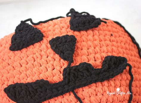 Crochet Jack-O-Lantern Pumpkin Pouf - Repeat Crafter Me Crocheted Jack O Lanterns, Crochet Jackolantern Face, Crochet Jack O Lantern Hat, Crochet Pumpkin Face Free Pattern, Crochet Jack O Lantern Applique, Jack O Lantern Crochet Pattern Free, Crochet Jack O Lantern Pattern, Jack O Lantern Crochet, Crochet Jackolantern