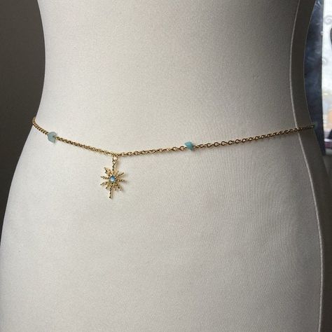 Enhance your summer style with this stunning gold waist chain featuring eye-catching blue crystals and a gold charm. This unique accessory is perfect for adding a touch of elegance and fun to any outfit. Whether you're headed to the beach or a festival, this waist chain is sure to turn heads and make a statement. Handcrafted with love, this piece is a must-have for any jewellery lover looking to elevate their look effortlessly. Each stone fragment is added by hand.  Waist chain comes in 3 sizes, Dr Accessories, Gold Waist Chain, Youtuber Dr, Ethereal Jewelry, Blue Or Pink, Waist Beads, Belly Chain, Waist Chain, Body Jewellery