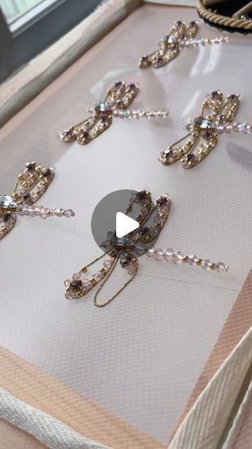 Embroidery Designer on Instagram: "3D Hand Embroidered Dragonflies for @felisitigreis ⁣💕✨ ⁣ #tambourbeading #beading #beadembroidery #luneville #beadwork #dragonfly #embroideryvideo #wedding #bespoke #weddingdress #seedbeads #sequins #embroiderydesign #coutureembroidery #craft  #embroiderydesigner #tambourembroidery #embellishment #crystalbeads #satisfying #theadwork #handmadeuk #madeinlondon #asmr #stitch #sewing #rhinestones #crystals #couture" Crystal Embroidery Designs, Embroidered Dragonflies, Sewing Rhinestones, Beaded Dragonflies, Tambour Beading, Beaded Dragonfly, Stitch Sewing, Crystal Embroidery, Tambour Embroidery