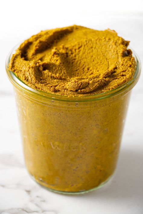 Golden turmeric paste (aka golden paste) is a concentrated paste made from coconut oil, turmeric, and other spices that you can use to make tea, a golden milk latte, or stir into yogurt, smoothies, salad dressings, and curry sauces. Golden Milk Paste, Golden Milk Recipe Turmeric, Golden Milk Tea, Golden Paste, Golden Milk Recipe, Turmeric Paste, Golden Milk Latte, Turmeric Spice, Turmeric Milk