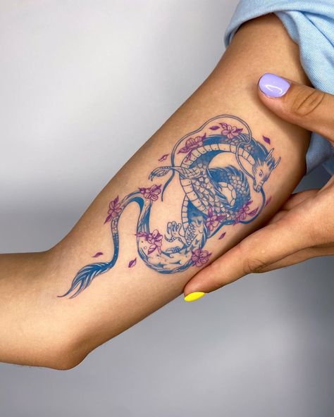 Taylan Ulukır on Instagram: “Cute blue dragon with purple flowers for Elif.. It was nice meeting you guys, thank you! 💙🐉💜🐉 . . . . #tattoodesign #snaketattoo…” Blue Ink Dragon Tattoo, Purple Dragon Tattoo For Women, Blue Dragon Tattoo For Women, Blue Ink Tattoo Words, Purple And Blue Tattoo, Blue And Red Tattoo, Colored Tattoos For Women, Red And Blue Tattoo, Dragon Art Tattoo