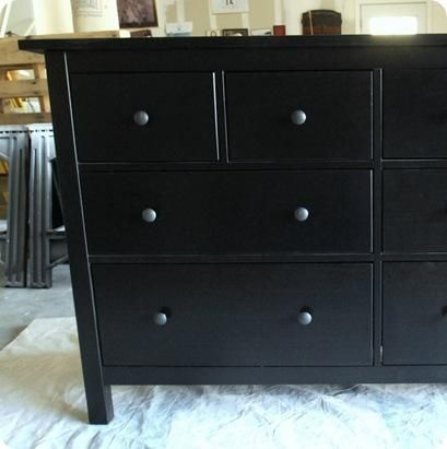 How to paint over laminate...i used zinsser primer, then painted entire entertainment center a dark brown, then applied old master gel stain in long stokes with sponge brush to give the look of wood grain. it matches the coffee table perfectly.