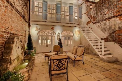 This Creole townhouse was built in 1830 and mixes French and Caribbean architectural elements. Our favorite feature? The stunning courtyard. View the listing on Zillow. French Colonial Homes, New Orleans Style Homes, French Colonial Style, New Orleans Decor, Creole Cottage, Modern Courtyard, New Orleans Style, French Style Homes, Courtyard Design