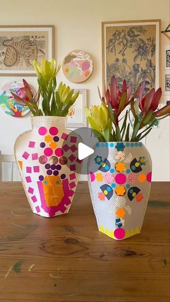 Mini Mad Things on Instagram: "How cool are these cardboard vases from the most awesome book Let’s Make Art! This book includes SO MANY of the coolest art projects, from hats and masks to capes and sculptures. All made with pretty simple art supplies. For this cardboard vase we used an old cereal box, stickers, old paintings punched into circles and flowers and staples. I stock this awesome book, and lots more kids art & craft books, on my website. Book by @letsmakeartuk #recycleandplay #recycledctafts #easycrafts #craftsofinstagram #craftideas #craftersgonnacraft #recycle #play #upcycledartmakecreate" Kids Vase Craft, Cool Vases, Cardboard Vase, Flower Pot Art, Craft Books, Vase Crafts, Upcycled Art, Cool Art Projects, Paper Hat