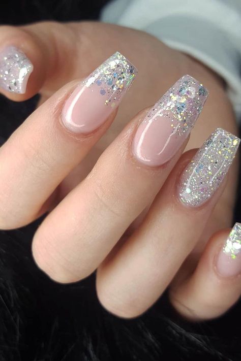 Experience the subtle enchantment of these long, coffin-shaped nails. They feature a soft pink base that transitions into a dazzling cascade of silver glitter, which fades elegantly towards each nail's base. Perfect for adding a touch of glam without overwhelming charm. Sparkle on, beauties! ✨  // Photo Credit: Instagram @rrezi.k Glitter Nails Ideas, Sparkly Ombre Nails, Silver Sparkly Nails, Birthday Nail Designs, Silver Nail Designs, Silver Glitter Nails, Wedding Nails Glitter, Ombre Nails Glitter, Coffin Shape Nails