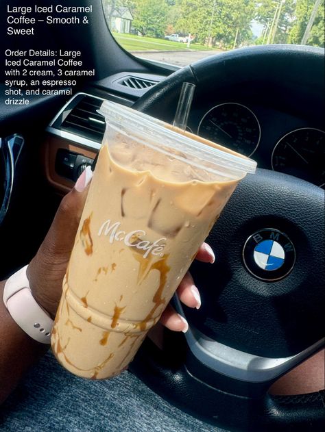 A hand holding a McCafé cup with iced coffee and extra caramel drizzle, in a car setting. Mcdonald’s Ice Coffee, Mcdonalds Coffee Order, Caramel Machiatto Iced, Mcdonald’s Coffee, Mcdonalds Iced Coffee Order, Mccafe Iced Coffee, Dunkin Orders, Mcdonalds Iced Coffee, Frozen Coffee Drinks