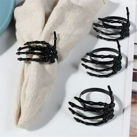 Halloween Party Creative Napkin Storage Ring Napkin Decoration Ring Features: With creative skeleton hand shape design, the napkin ring is perfect for Halloween, Christmas and Thanksgiving party table decoration. What the napkin ring can offer you is that is enough to meet the Halloween decor needs of your warm family or cafeteria. Made of alloy material, it is long lasting. The length of the napkin ring is 5.5cm and the width is 5cm. It is suitable to use in festival, dinner party or banquet. Product Description: Halloween Party Creative Napkin Storage Ring Napkin Decoration Ring Material: Stainless steel Color: as the picture shows, (Due to the difference between different monitors, the picture may have slight color difference. please make sure you do not mind before ordering, Thank you! Halloween Wedding Place Cards, Gothic Decorations Party, Halloween Wedding Table Settings, Halloween Place Settings, Elegant Halloween Tablescape, Gothic Birthday Party Decorations, Halloween Tablescape Elegant, Halloween Decor Classy, Goth Wedding Decorations