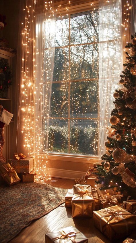 Bright room with a large window adorned with white lights and garlands, gifts in gold, and a frosty Christmas tree. Christmas Tinsel Garland Ideas, White Lights Christmas, Warm Christmas Aesthetic, Christmas Window Decor, White Christmas Decor Ideas, Colored Christmas Lights, Holiday Window Display, White Christmas Lights, Wonderland Christmas