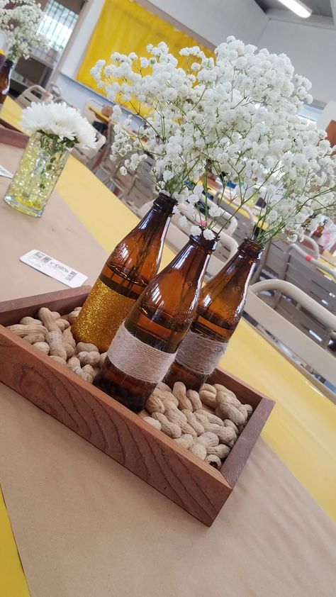 Peanuts Centerpiece Table Decorations, Beer Bucket Centerpiece Ideas, Decorated Beer Bottles, Beer Stein Centerpiece, Peanut Centerpiece, Bucket Centerpiece Ideas, Beer Bottle Centerpieces, Bucket Centerpiece, Beer Birthday Party