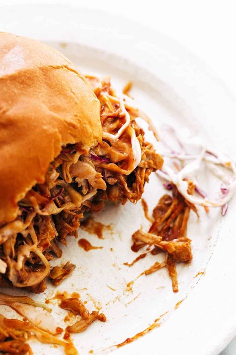 BBQ Jackfruit Sandwiches! These BBQ Jackfruit Sandwiches feature a meaty mix of jackfruit and chickpeas tossed in spices, garlic, and a bit of BBQ sauce. Pile it all on top of a toasted bun with slaw and dinner is ready! #jackfruit #sandwich #vegetarian Starch Based Diet, Salmon Tacos Recipe, Sandwich Vegetarian, Jackfruit Sandwich, Canned Jackfruit, Vegetarian Substitutes, Bbq Jackfruit, Pulled Pork Sandwiches, Pork Sandwiches