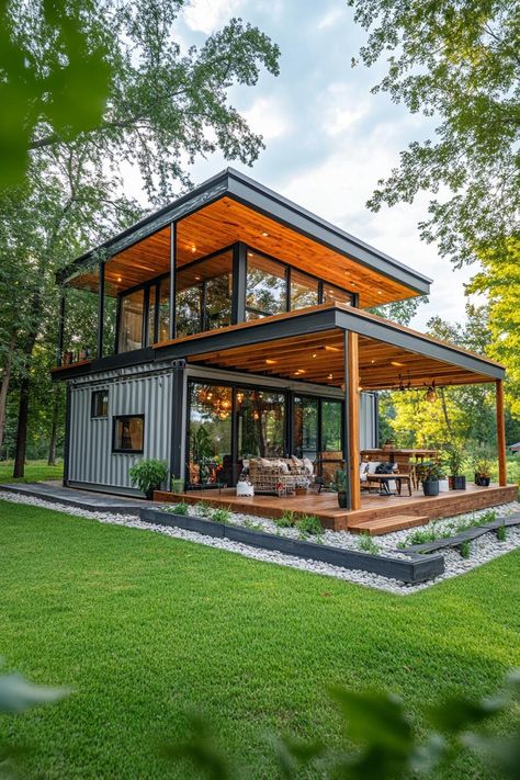 Modern shipping container home with mono pitch roof and porch with wooden beams. Check out these shipping container homes and learn their advantages, design appeal, and unique characteristics. Shipping Container Architecture Design, Vertical Shipping Container Home, Modern Container Homes, Pitch Roof, Shipping Container Design, Modern Tropical House, Shipping Container Home Designs, Storage Container Homes, Shipping Container House Plans