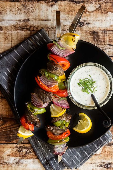 Moroccan Beef Kabobs with Mint Yogurt Sauce Moroccan Spice Blend, Moroccan Beef, Mint Yogurt Sauce, Grilled Peppers And Onions, Mint Yogurt, Kabob Skewers, Beef Kabobs, Roasted Fennel, Veggie Bowl