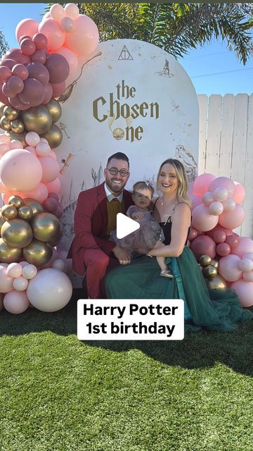 Loryn Powell on Instagram: "This Harry Potter 1st birthday was siriusly magical ✨ 

Catering & food display: @clcateringdecor 
Backdrop and balloons: @rentbohobabes 
Castle bounce house: @inflatesandiego 

#harrypotter #firstbirthday #babygirl #harrypotterparty #husbandandwife #thechosenone" Pink And Gold Harry Potter Birthday, Harry Potter First Birthday Party Ideas, Harry Potter 10th Birthday Party Ideas, Chosen One Birthday Harry Potter, Harry Potter 1st Birthday Girl, First Birthday Harry Potter, Harry Potter First Birthday Girl, 1st Birthday Harry Potter, 1st Birthday Backdrop Ideas