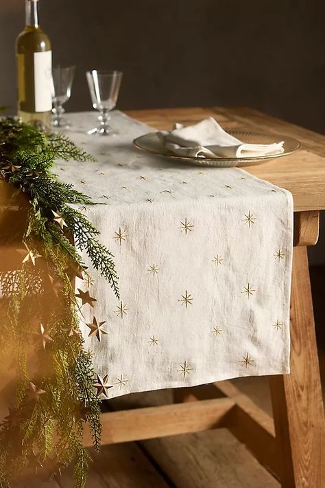 Kitchen Linens, Table Runners & Aprons | Anthropologie Christmas Tablecloth Ideas, Linen Runner, Embroidered Table Runner, Holiday Tablescapes, Star Embroidery, Christmas Table Cloth, Christmas Tablescapes, Embroidered Linen, Golden Star