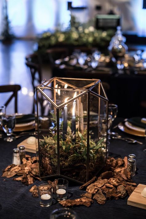 This elegant, enchanted forest wedding has the magical vibes you need LGBTQ+ weddings moody romantic two grooms gay wedding tuxedos woods candle votives centerpiece Wedding Ideas Woods Forest, Forest Night Wedding, Goth Wedding Decorations Centerpieces, Twilight Wedding Aesthetic Reception, Terrarium Wedding Decor, Magic Theme Wedding, Wedding Ideas Forest Theme, Dark Whimsical Wedding Theme, Dark Victorian Wedding Theme