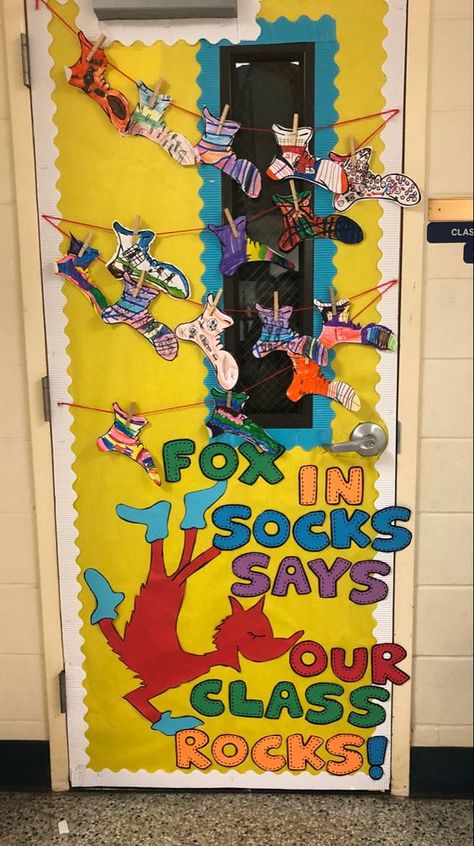 Dr. Seuss Classroom Door Decorations | Today's Creative Ideas Dr Seuss Classroom Theme Bulletin Boards, Kindercare Classroom Prek, Dr Seuss Socks Ideas, Dr Seuss Room Transformation, Fox In Socks Door Decoration, Read Across America Classroom Door, Read Across America Door Ideas, Cat In The Hat Classroom Door, Fox In Socks Bulletin Board