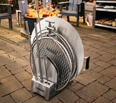 Breeo is continuing to expand the versatility of its popular smokeless fire pits. They recently released a heat deflector, and now they've released an accessory for searing. If you don't know what to do with all the fire pit accessories when you're not using them, Breeo has an answer in the form another new product, the 304 Dock. Breeo Fire Pit, Fire Pokers, Fire Pit Accessories, Stainless Steel Pans, Outdoor Kitchens, Fire Pits, Patio Deck, The Fire, Outdoor Living Space