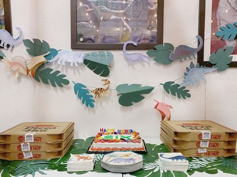 dinosaurs, pizza, and meri meri cuteness for a 6th birthday party Dinosaur Birthday Party 6, Minimalist Dinosaur Party, Meri Meri Dinosaur Party, Meri Meri Dinosaur Cake, Dinosaur Birthday Kids Table, Dinosaur Birthday Party Meri Meri, Meri Meri Dinosaur, Jurassic Park Party, Bouncy House