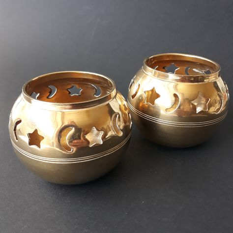 Set of Two Vintage Brass Tealight Candle Holders in Moon or Star Pattern. Small Brass Votive Candleholders. Thick and Sturdy Brass. Patina. Preowned. Good Vintage Condition. Measurements: Hight - 6.5 cm (2.55") Width at the widest point - 8 cm (3.14") Weight for Set of Two - 250 g All orders are sent as registered packages with tracking numbers. Thank You for visiting Funvintageera! Vintage Celestial Decor, Thrifted Trinkets, Celestial Furniture, Celestial Living Room, Candles Vintage, Celestial Decor, Vintage Brass Decor, Moon Table, Mazzy Star