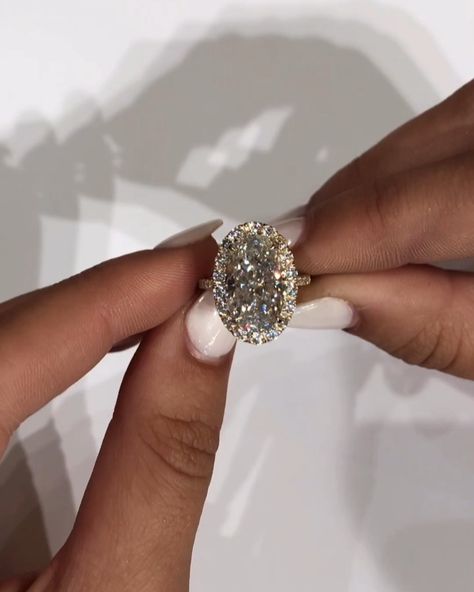 EAST WEST // GEM COMPANY on Instagram: “Our hybrid stones + a halo are so mesmerizing! One client in a showing described the facet pattern as something you could “fall into” and…” Engagement Ring Oval Halo, East West Gem Co, Engagement Ring Oval, Oval Diamond Ring, Moissanite Engagement Ring Oval, Engagement Ring Shapes, Yellow Gold Engagement Rings, Engagement Rings Oval, Ring Oval