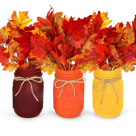 PRICES MAY VARY. Package Includes - You will get 3 set fall Mason jar ornaments, including yellow, orange and red-brown Mason jars and faux maple leaf bunches. It has an elegant design and beautiful flower arrangements for any of your fall home decor needs. Autumn Decor - This beautiful fall colored Mason jar comes with fall maple leaves to add a luxurious touch to your special fall and Thanksgiving celebration, and the unique design will bring a rustic farmhouse feel to your home. Suitable Size Fall Decorations For Table, Fall Decor Ideas For Office Cubicle, Friendsgiving Centerpieces, Fall Party Centerpieces For Table, Fall Decor For Office, Thanksgiving Center Pieces, Centerpiece For Round Table, Thanksgiving Aesthetics, Orange Color Party