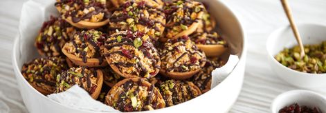 Florentine Christmas Tarts - Carême Pastry Christmas Tarts, Baking Weights, Cold Cereal, Pistachios Nuts, Tart Shells, Shortcrust Pastry, Raw Cashews, Shredded Coconut, Dried Cranberries