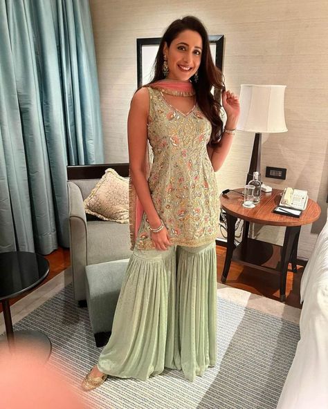 Pragya Jaiswal in sage green gharara set by Bhumika Grover for Diwali Green Indian Outfit, Fizzy Goblet, Green Sharara, Gharara Designs, Pragya Jaiswal, Frock Patterns, Simple Kurti Designs, Traditional Indian Dress, Indian Dresses Traditional