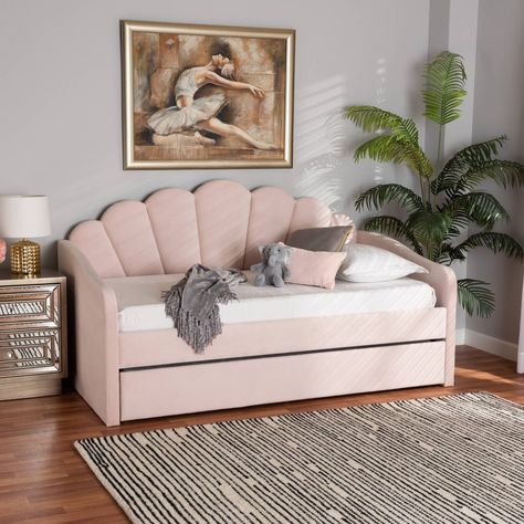 Rest and lounge with your cares aside in the glamorous yet sprightly design of the Timila daybed. Made in Malaysia, this stunning piece is comprised of a wood frame padded with soft foam and upholstered in sumptuous velvet fabric. Scalloped edges form a pleasant, seashell-inspired silhouette while the roll-out trundle provides easy accommodations for overnight guests. The Timila requires assembly and utilizes wood slats for mattress support, eliminating the need for a box spring. Gently sloping Full Daybed With Trundle, Pink Velvet Fabric, Full Daybed, Twin Size Daybed, Full Size Daybed, Trundle Mattress, Modern Daybed, Contemporary Light, Upholstered Daybed