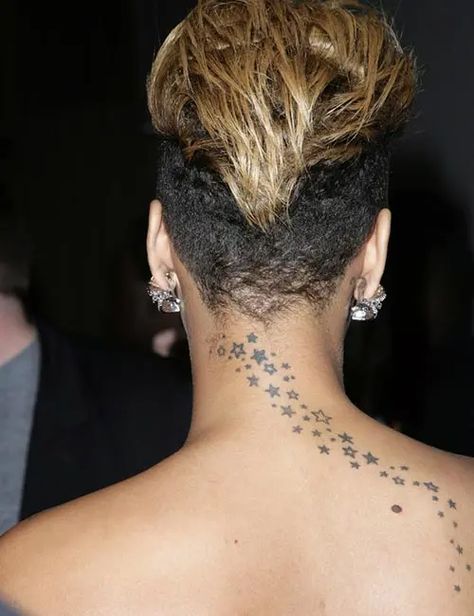 19 Magnificent Tattoos Sported by Rihanna And What They Mean Stars On Neck Tattoo, Rihanna Neck Tattoo, Rihanna Star Tattoo, Rhianna Tattoos, Shhh Tattoo, Inner Ear Tattoo, Tattoo Stars, Rihanna Tattoo, Best Neck Tattoos