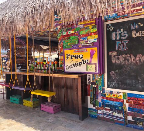 Domincan Republic, beach bar, beach, bar, vacation, colorful, swings, bar with swings, liquor, alcohol, aesthetic, vacation aesthetic, beach aesthetic, beach bar aesthetic, sand, sky, sunny, destination, relax Beach Juice Bar, Caribbean Bar Ideas, Caribbean Bar, Beach Bar Decoration, Beach Bar Aesthetic, Beach Club Aesthetic, Beach Bar, Surf Bar, Dominican Republic Beaches